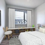 Chambre d'enfant avec lit et décoration murale.
